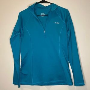 Teal Reebok quarter zip activewear top